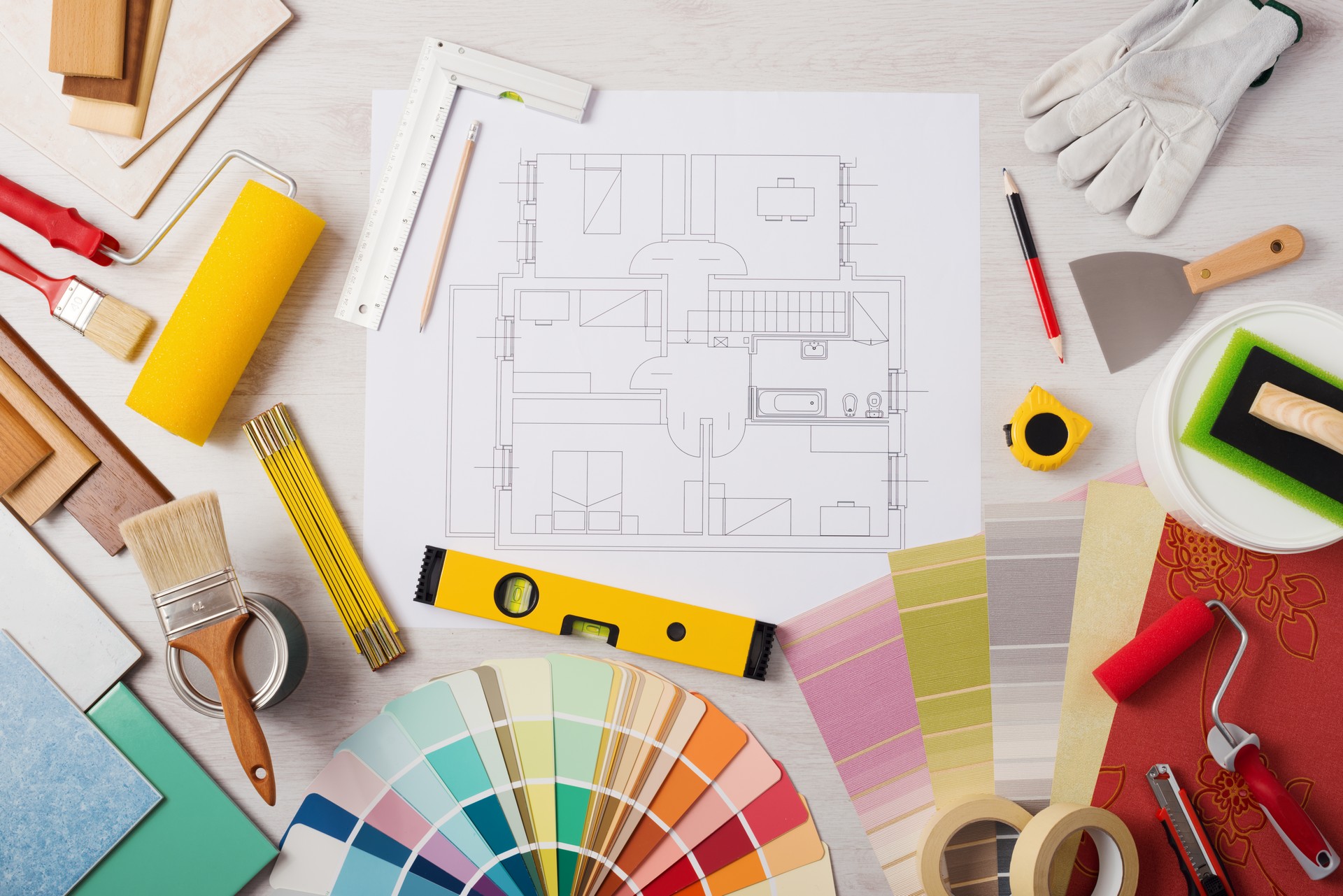 Decorator,Work,Table,With,House,Project,,Paint,Brush,And,Painting